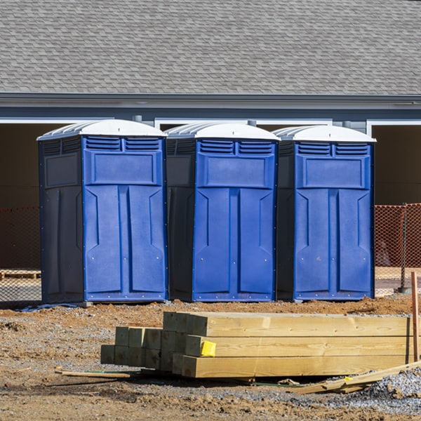 what is the cost difference between standard and deluxe portable toilet rentals in Cutler